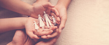 Hands,Holding,Paper,Family,Cutout,,Family,Home,,Foster,Care,,Homeless